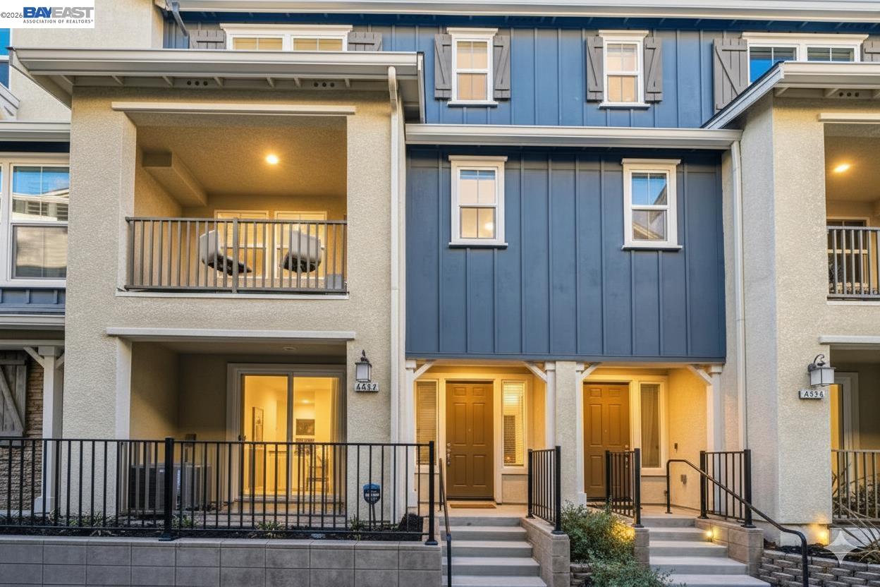 4022 Windsor Way Dublin, CA 94568 - Photo 50 of 55 a view of a brick house with a door