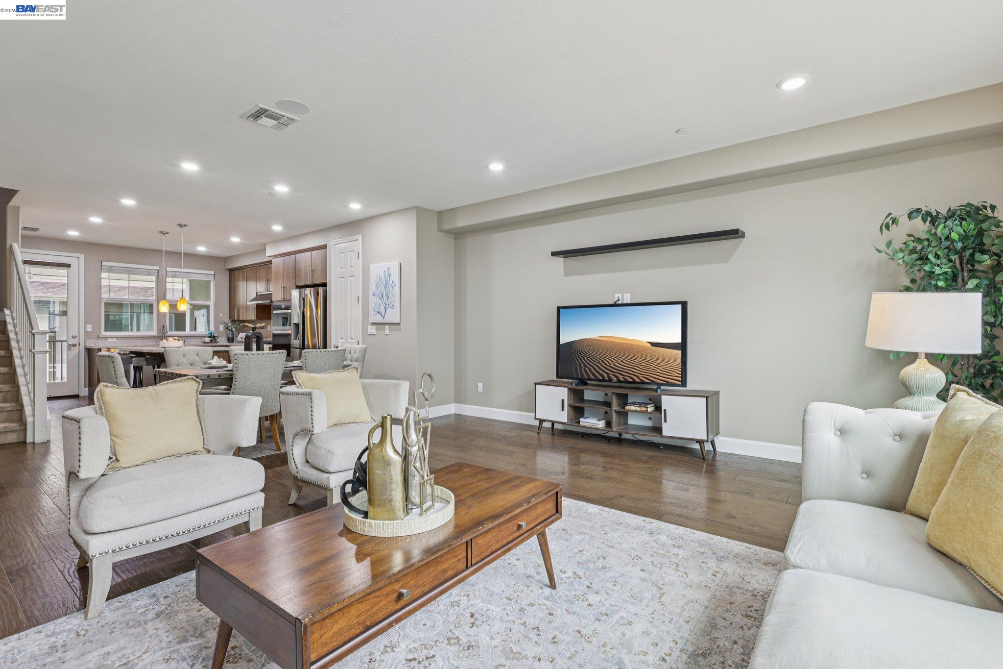 4022 Windsor Way Dublin, CA 94568 - Photo 5 of 55 a living room with furniture and a lamp