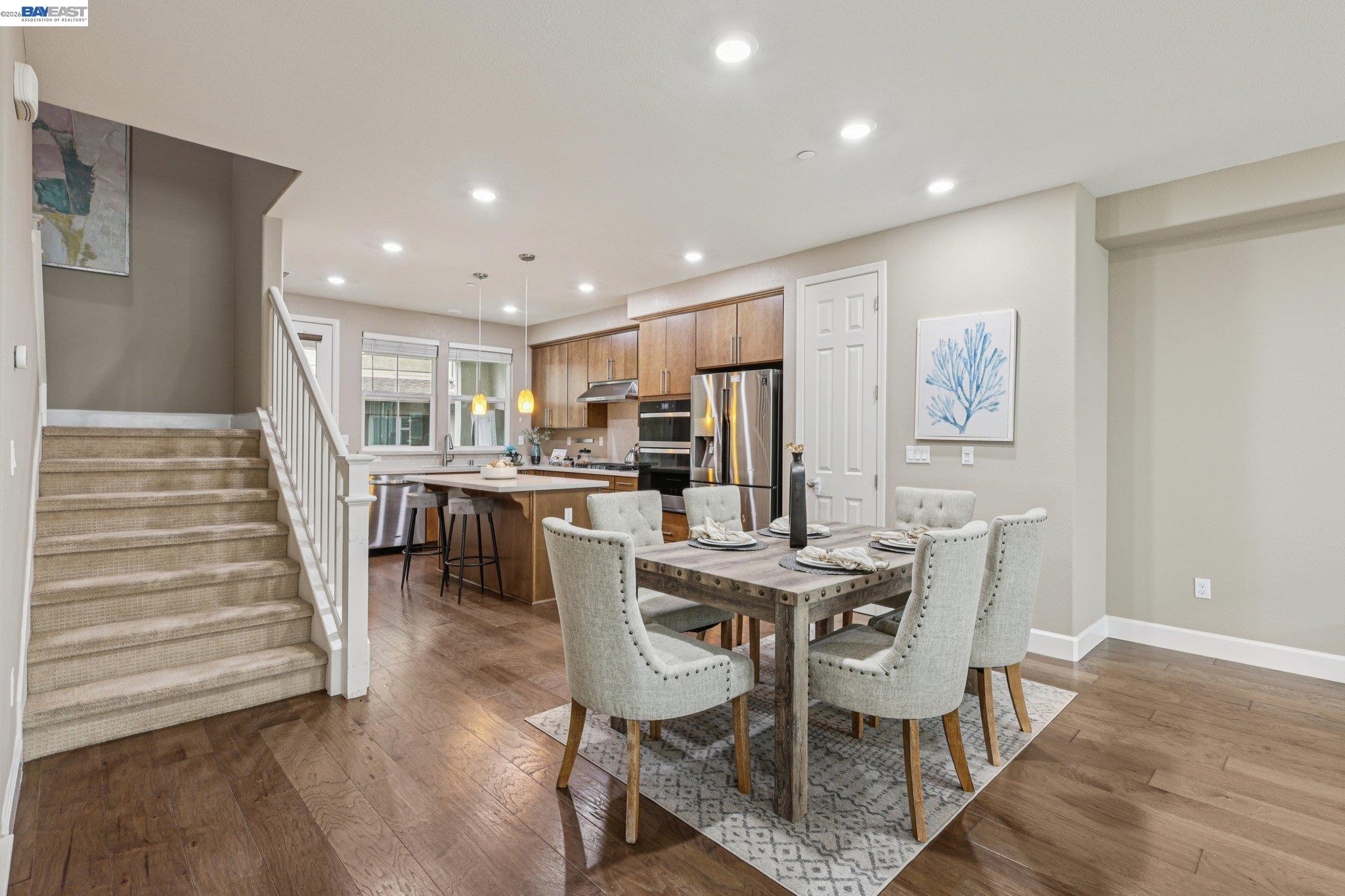 4022 Windsor Way Dublin, CA 94568 - Photo 6 of 55 a view of a dining room with furniture and wooden floor