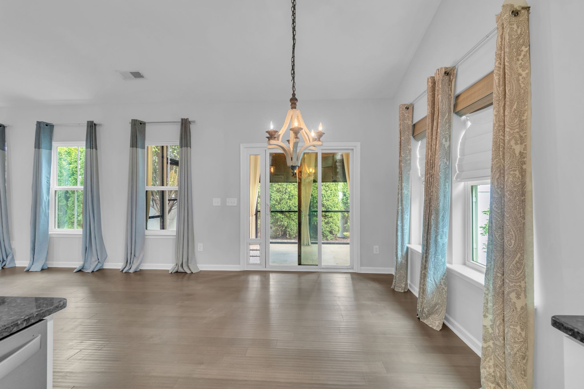 2827 Kellner Drive Murfreesboro, TN 37128 - Photo 15 of 26 a view of a room with large windows and kitchen view