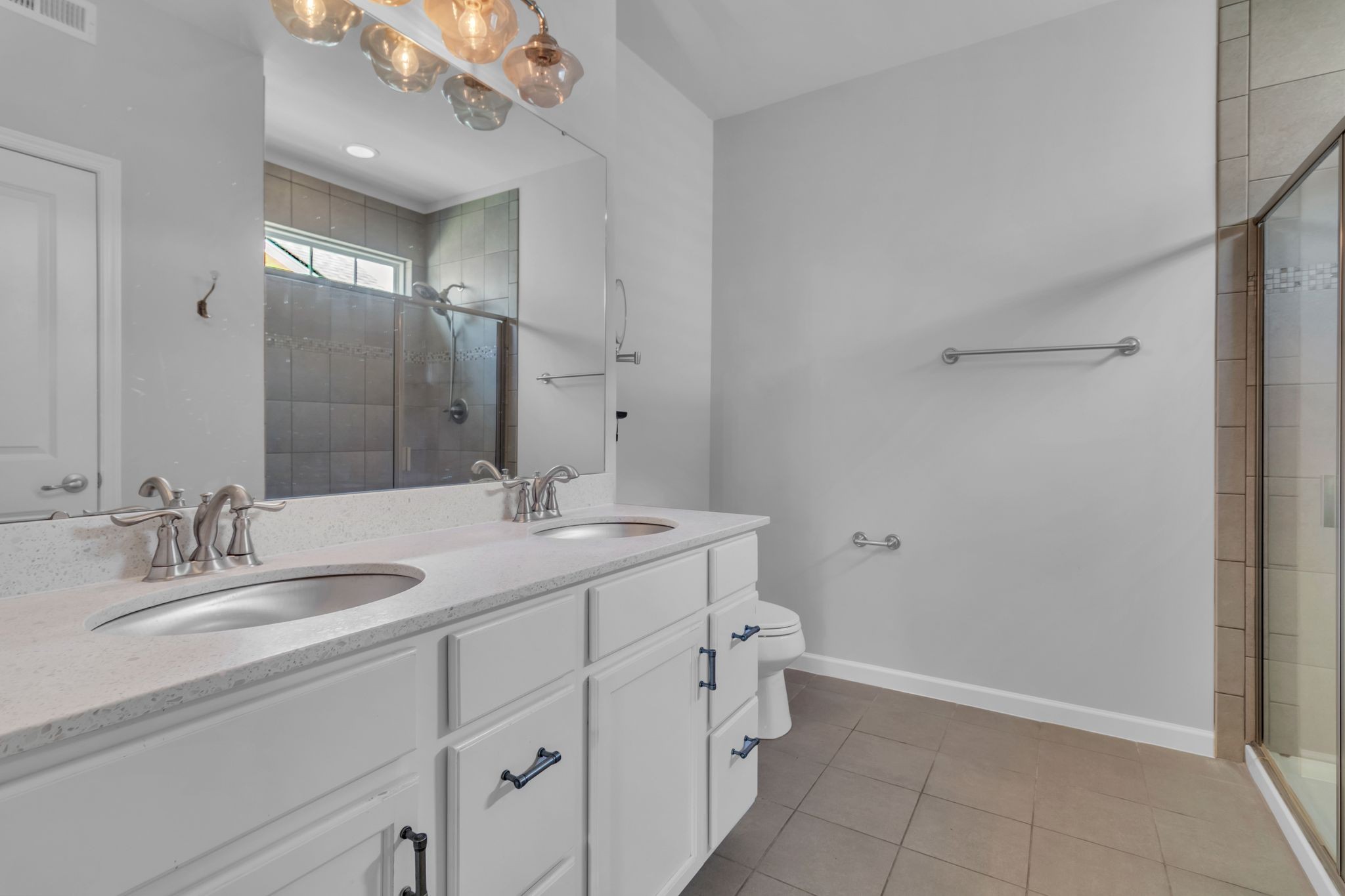 2827 Kellner Drive Murfreesboro, TN 37128 - Photo 19 of 26 a bathroom with a sink a vanity and a mirror