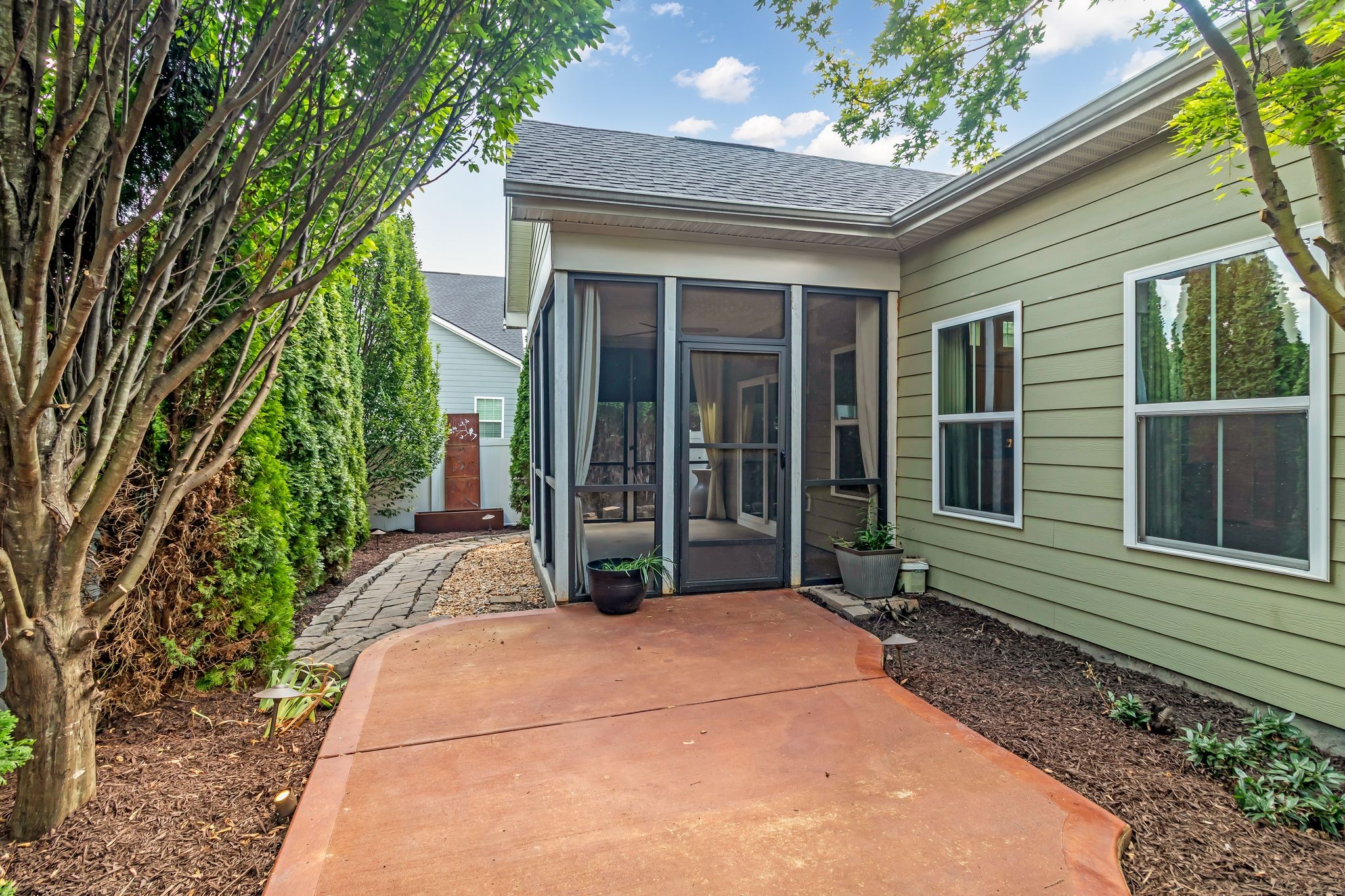 2827 Kellner Drive Murfreesboro, TN 37128 - Photo 25 of 26 a view of a house with a small yard plants and large tree