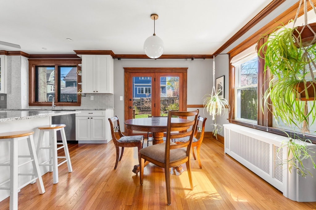 136 Beech Street Boston, MA 02131 - Photo 8 of 40 a view of a dining room with furniture window and outside view