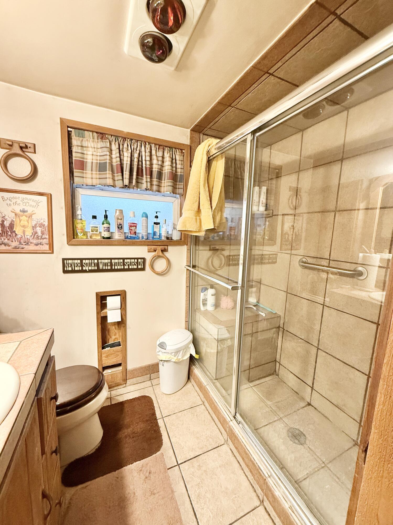 38965 Chiloquin Ridge Road Chiloquin, OR 97624 - Photo 50 of 59 a bathroom with a toilet and a shower