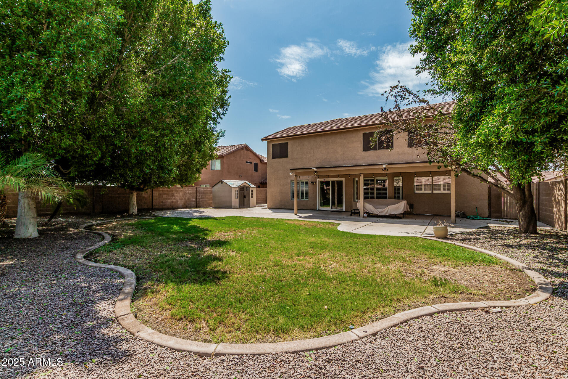 1038 East Harrison Court Gilbert, AZ 85295 - Photo 26 of 27 a view of a house with a yard