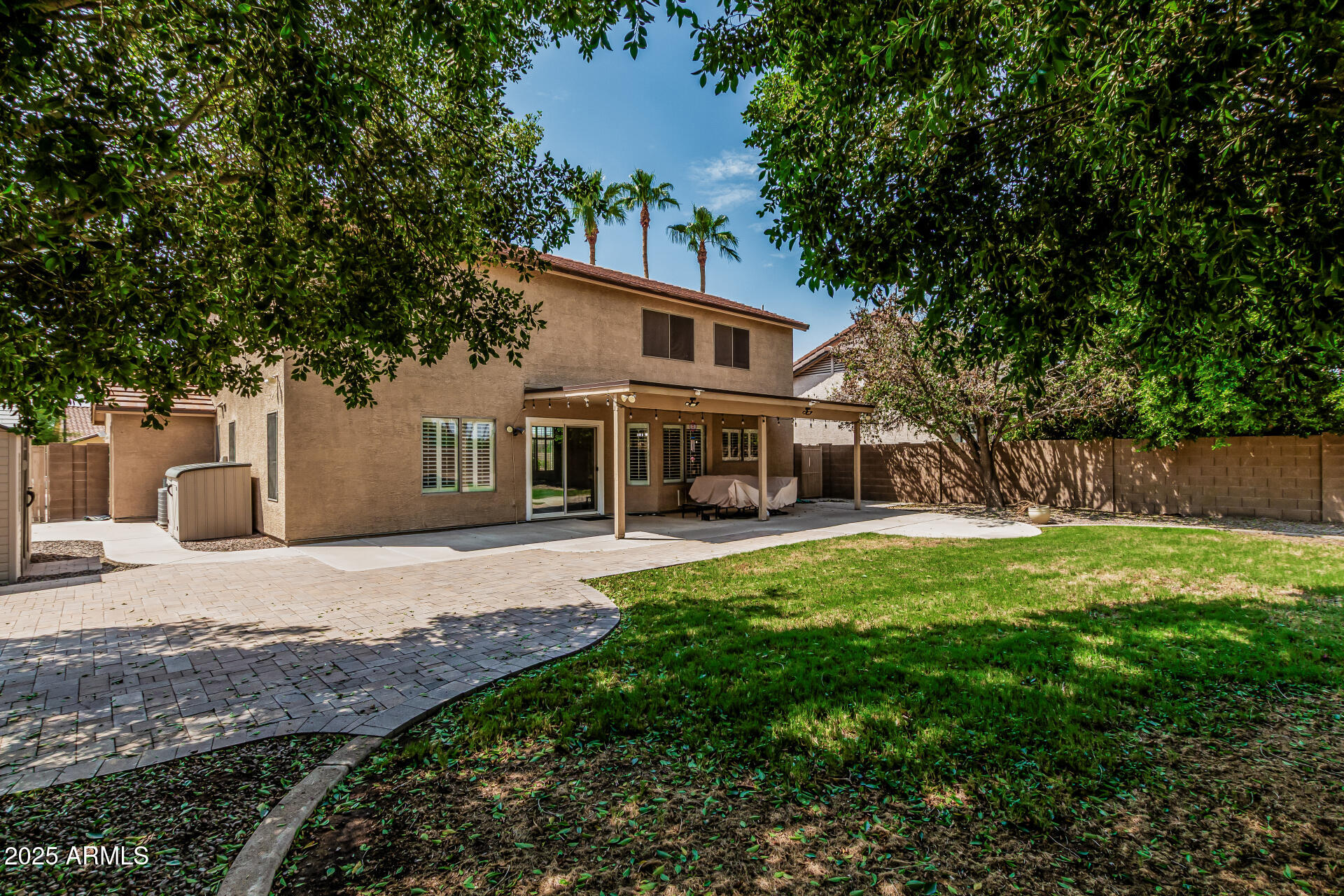 1038 East Harrison Court Gilbert, AZ 85295 - Photo 27 of 27 a front view of a house with a garden