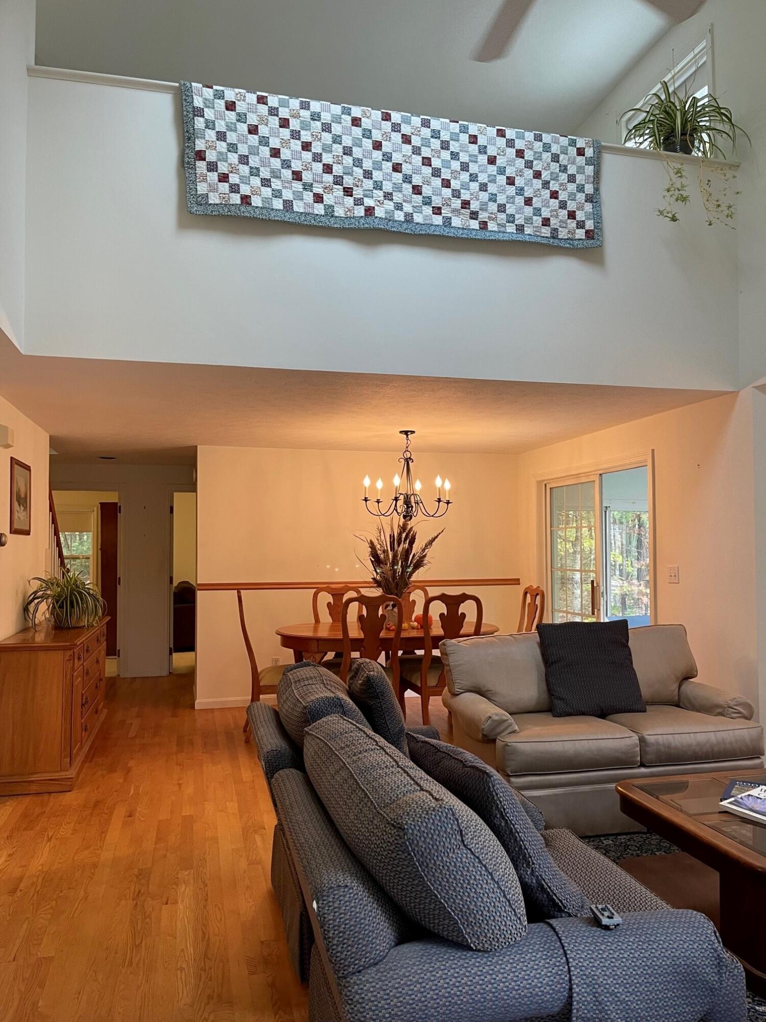 19 Windsor Commons Drive, Unit 19 Kennebunk, ME 04043 - Photo 11 of 68 Half wall to 2nd floor loft