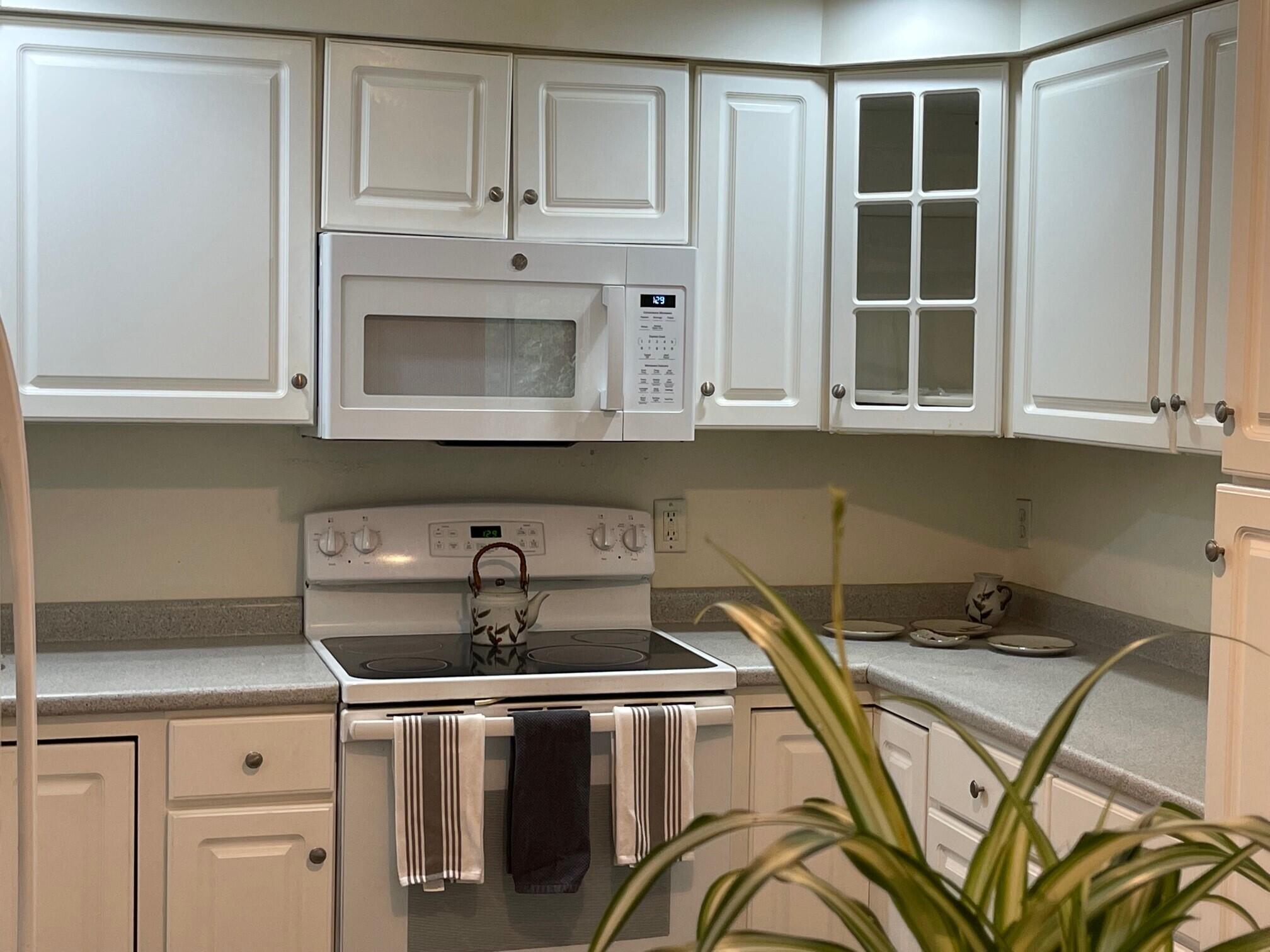 19 Windsor Commons Drive, Unit 19 Kennebunk, ME 04043 - Photo 15 of 68 Ample cabinet storage