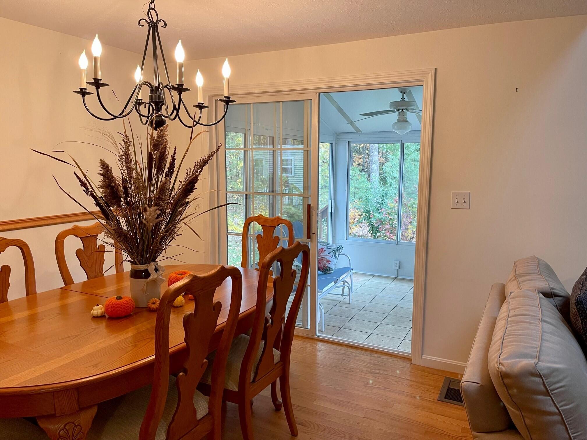 19 Windsor Commons Drive, Unit 19 Kennebunk, ME 04043 - Photo 19 of 68 Sunroom adds light