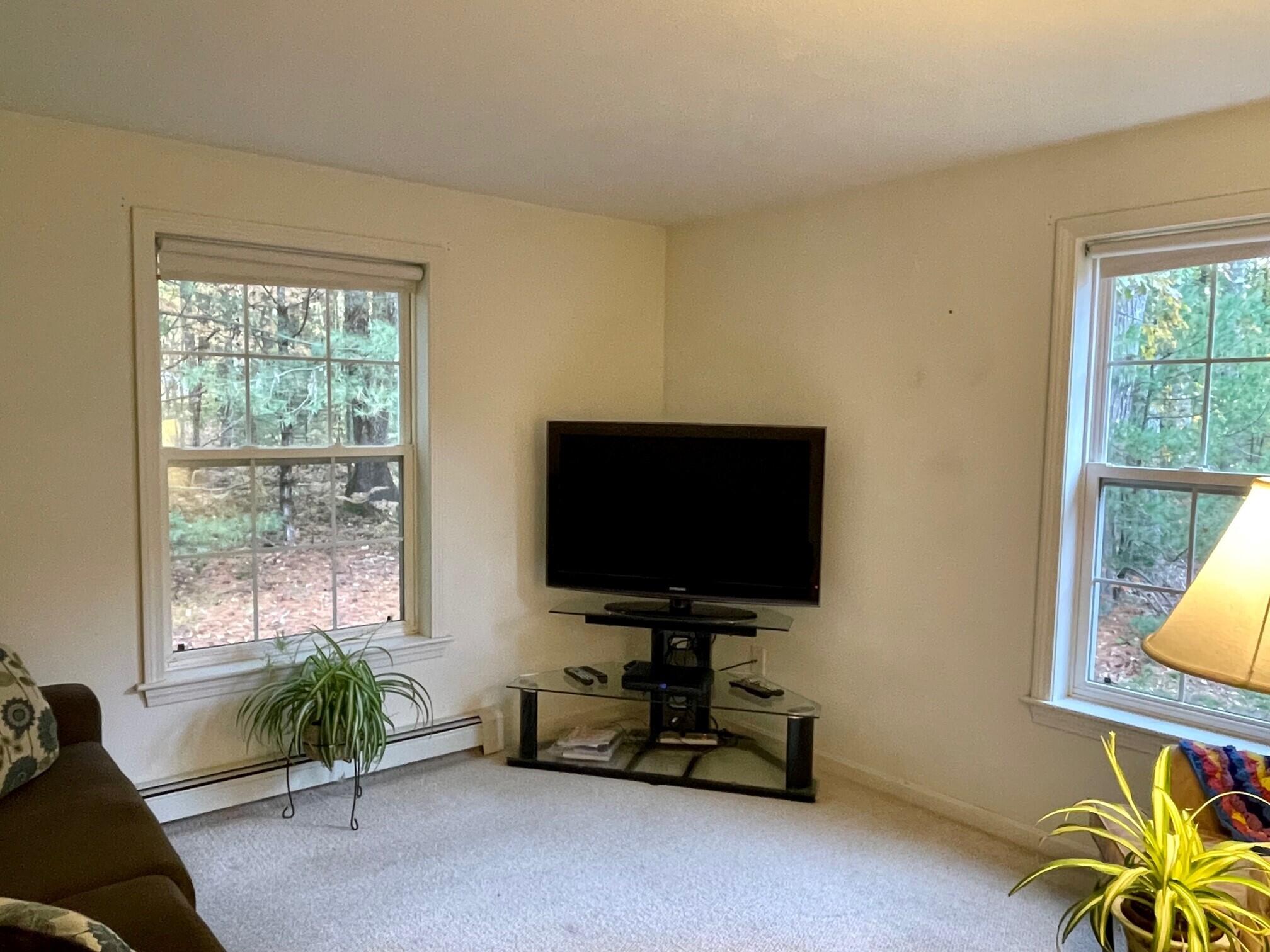 19 Windsor Commons Drive, Unit 19 Kennebunk, ME 04043 - Photo 28 of 68 The den could also be used for guests.
