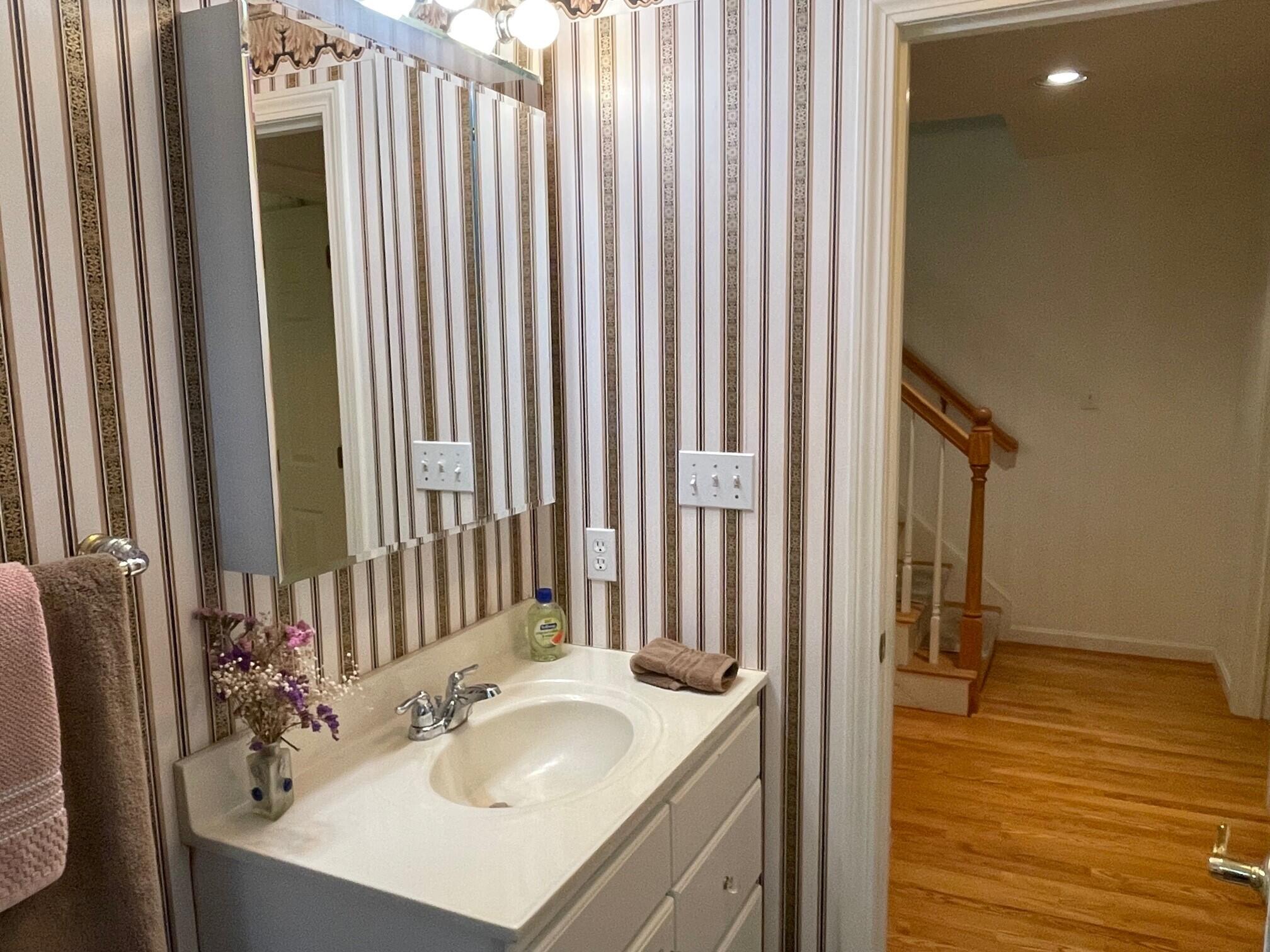 19 Windsor Commons Drive, Unit 19 Kennebunk, ME 04043 - Photo 33 of 68 Privately sited near the staircase