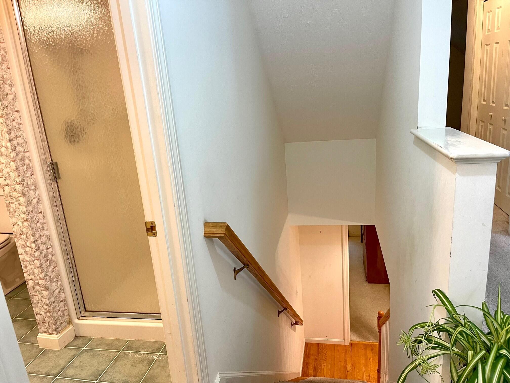 19 Windsor Commons Drive, Unit 19 Kennebunk, ME 04043 - Photo 55 of 68 Staircase to 1st floor