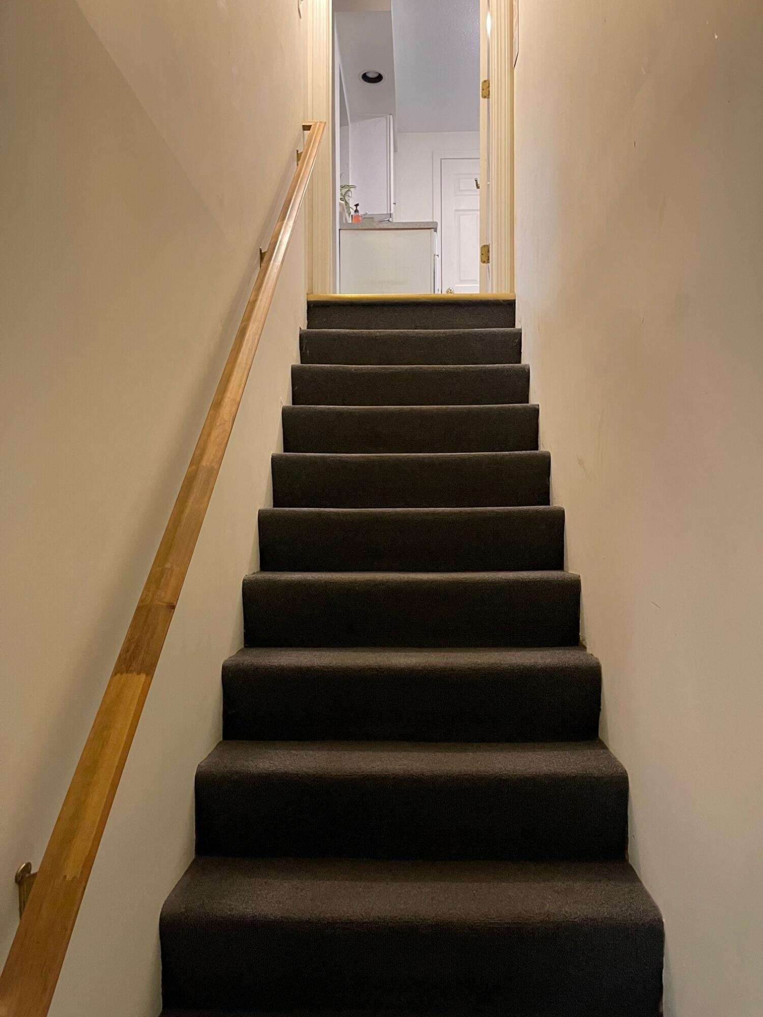 19 Windsor Commons Drive, Unit 19 Kennebunk, ME 04043 - Photo 56 of 68 Staircase 1st floor to basement