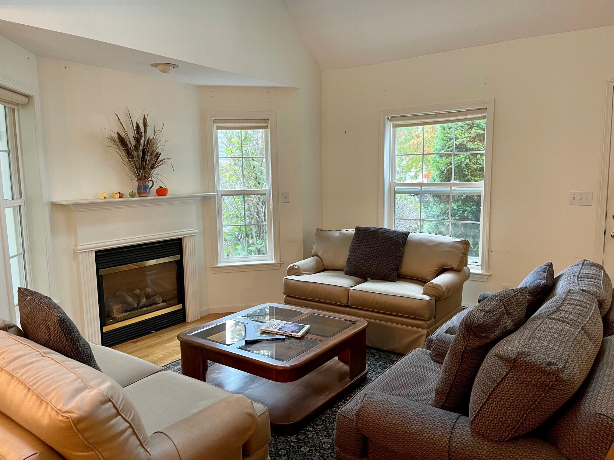 19 Windsor Commons Drive, Unit 19 Kennebunk, ME 04043 - Photo 9 of 68 Offers a cozy gas fireplace