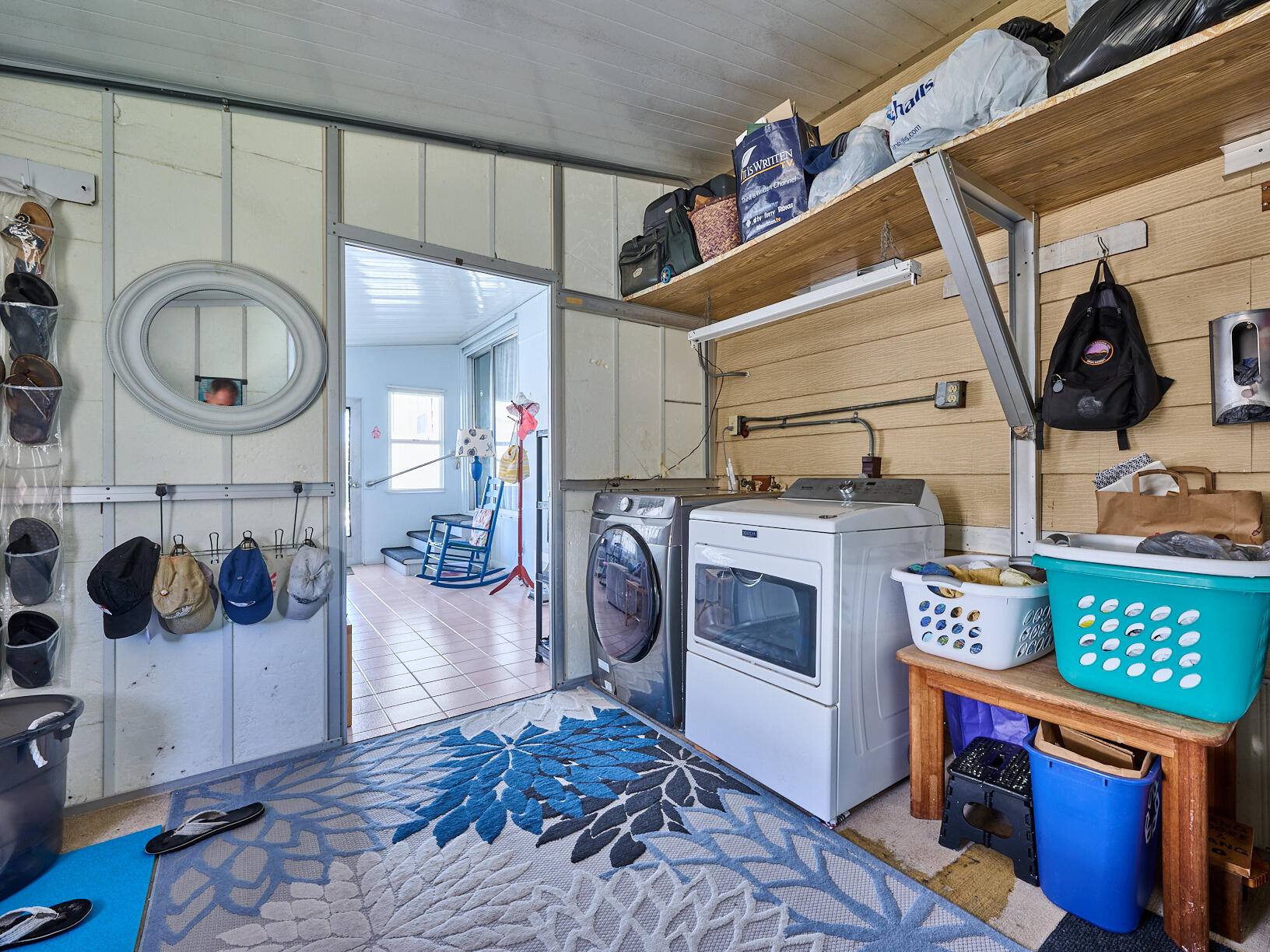 6977 Southeast Delegate Street Hobe Sound, FL 33455 - Photo 46 of 60 a kitchen with a stove and a wooden floor