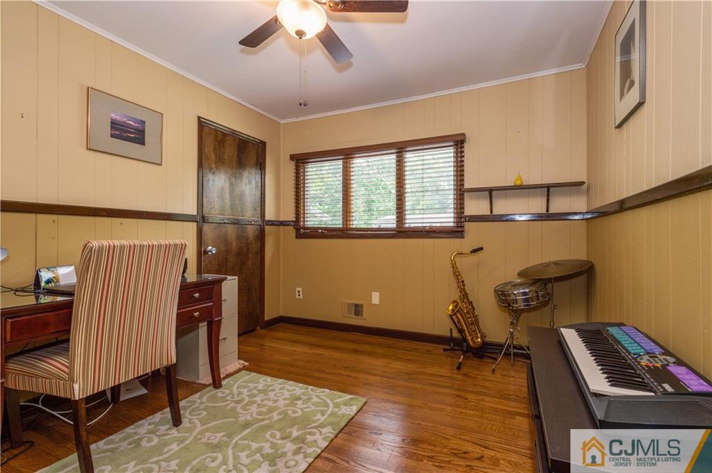 70 Wilk Road Edison, NJ 08837 - Photo 16 of 24 a room with furniture and a window