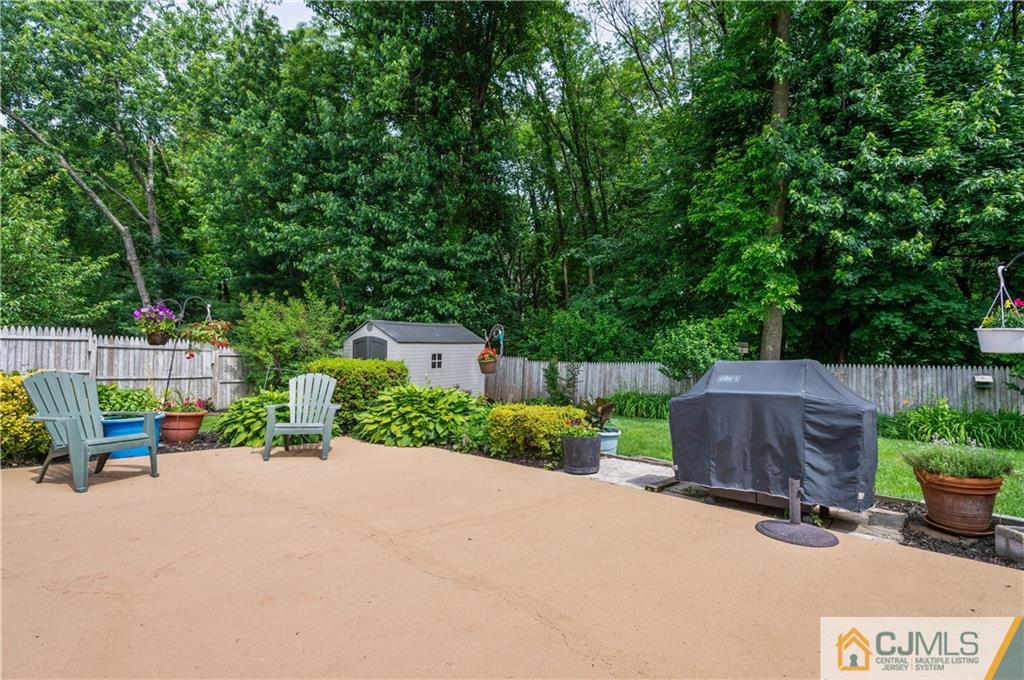 70 Wilk Road Edison, NJ 08837 - Photo 23 of 24 a street view with a outdoor space