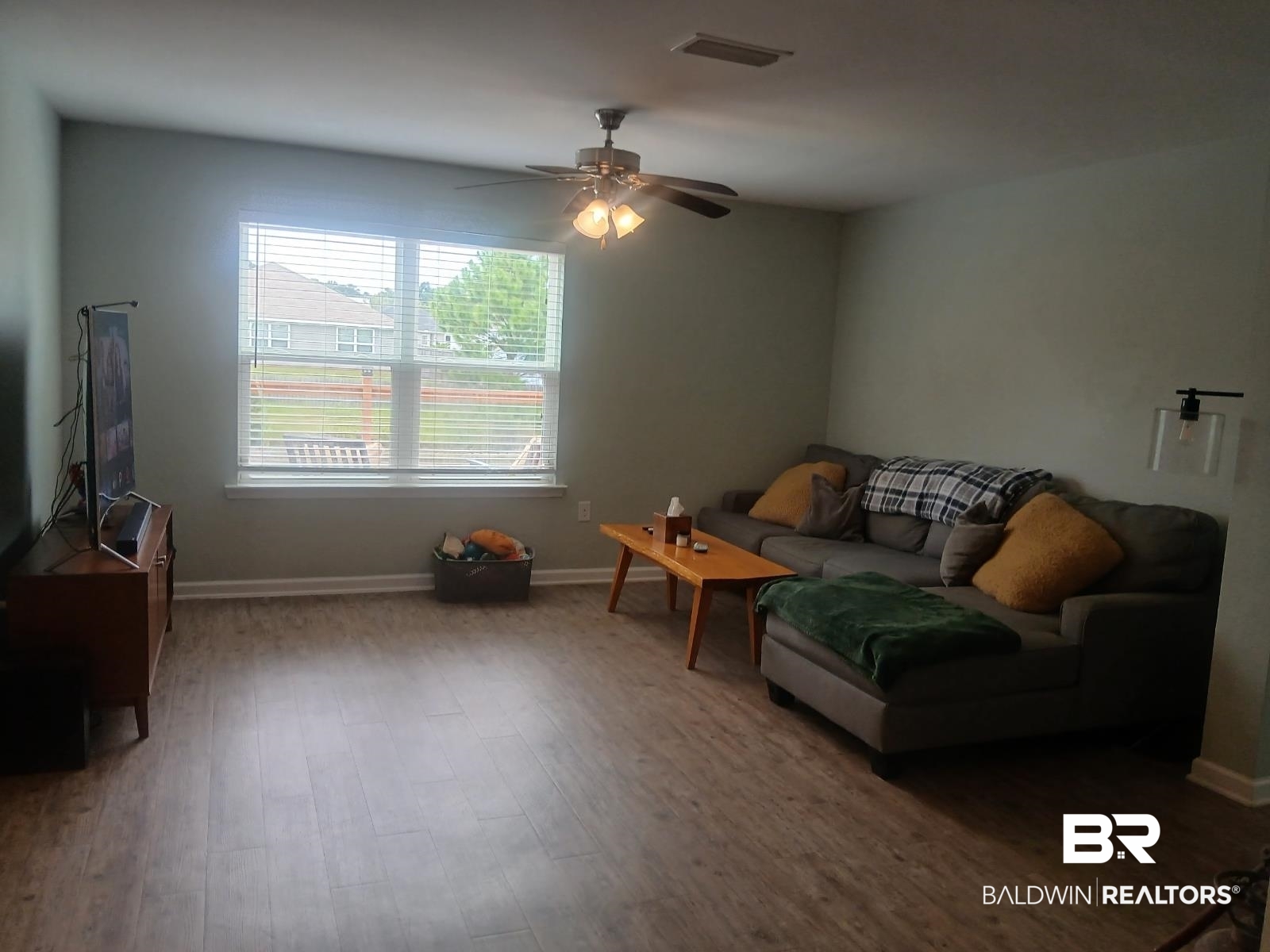 17431 Harding Drive Foley, AL 36535 - Photo 5 of 24 Living room with ceiling fan and hardwood / wood-style floors