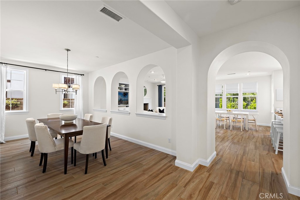3 Tranquility Place Ladera Ranch, CA 92694 - Photo 13 of 63 a view of a dining room with furniture and wooden floor