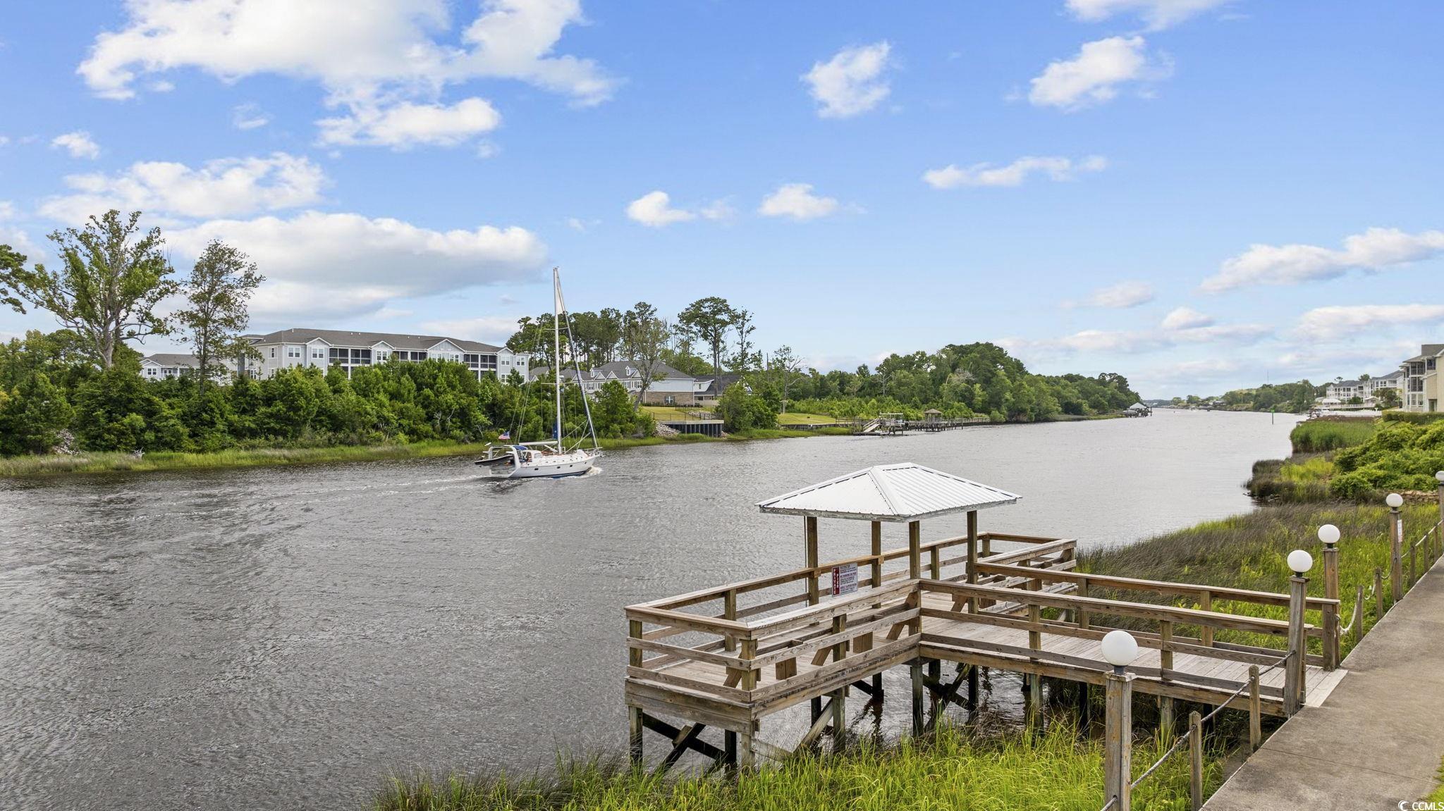80 Princess Drive North Myrtle Beach, SC 29582 - Photo 25 of 27 Dock area featuring a water view