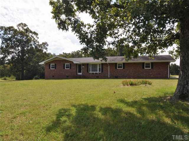 5512 Nob Hill Road Durham, NC 27704 - Photo 1 of 21 Spacious all brick ranch home on large six acre lo Exterior Front