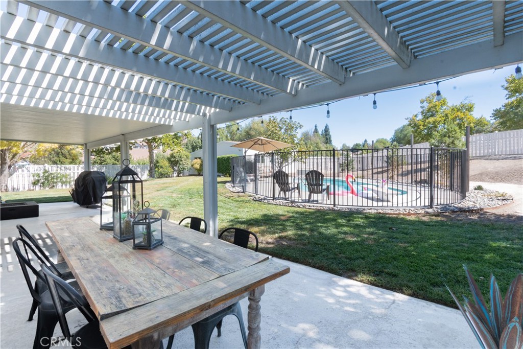 1766 Union Road Paso Robles, CA 93446 - Photo 18 of 31 a view of a patio with a table chairs and a backyard