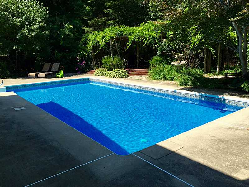 11 Azalea Avenue Exeter, RI 02822 - Photo 6 of 25 Swimming Pool/Hot Tub/Sauna. ENJOY AND ENTERTAIN IN THE SPACIOUS POOL PATIO SPACE