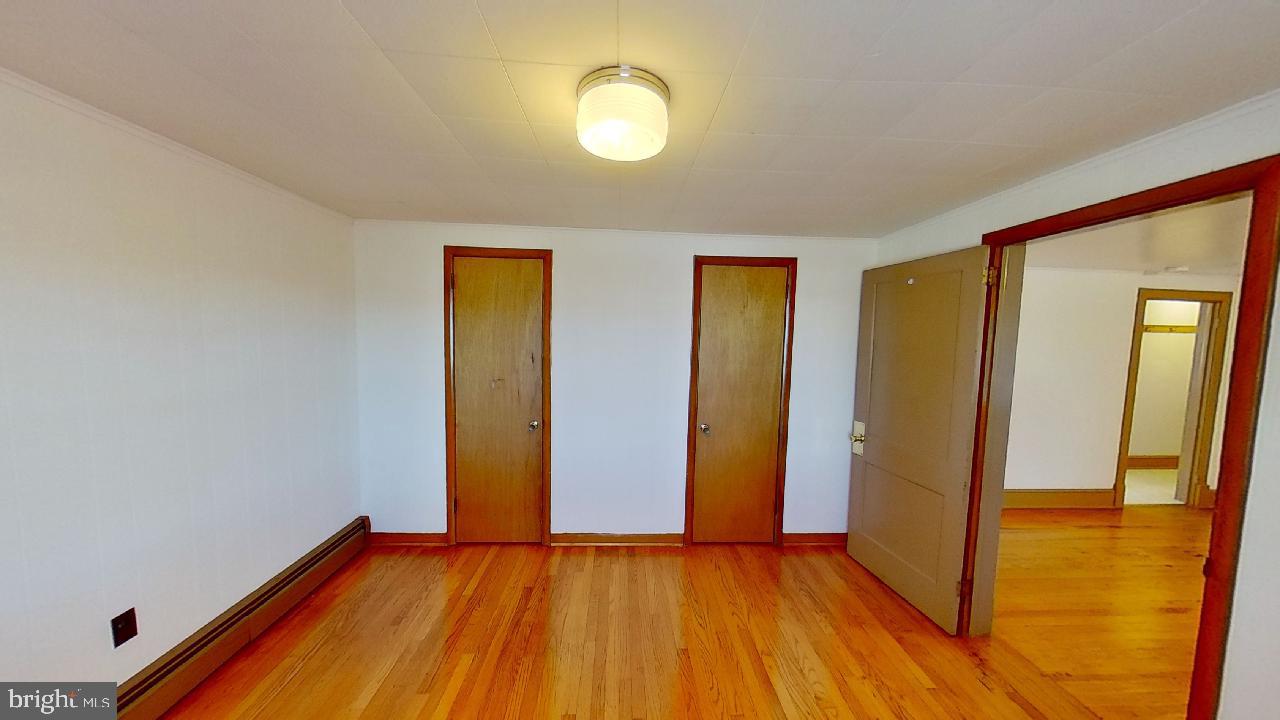 42464 Fairgrounds Road Leonardtown, MD 20650 - Photo 23 of 33 a view of room with window and wooden floor
