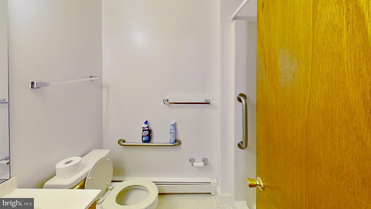 42464 Fairgrounds Road Leonardtown, MD 20650 - Photo 25 of 33 a bathroom with a sink and a tub