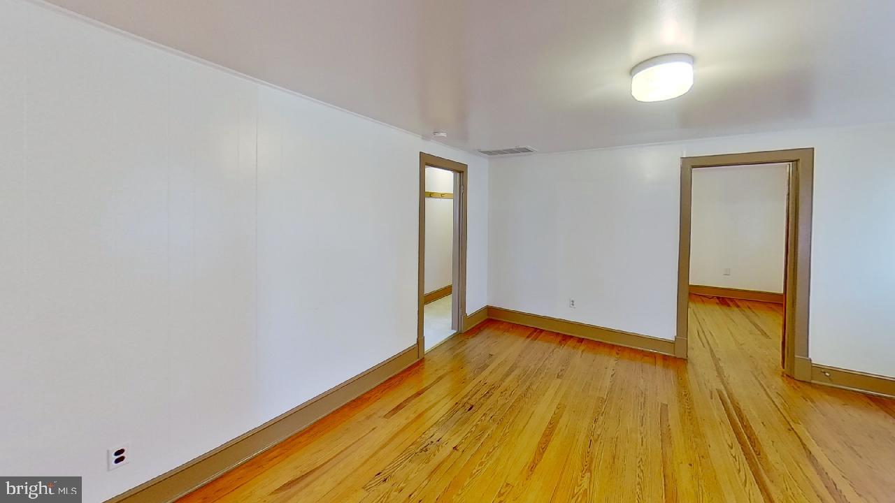 42464 Fairgrounds Road Leonardtown, MD 20650 - Photo 29 of 33 a view of empty room with wooden floor