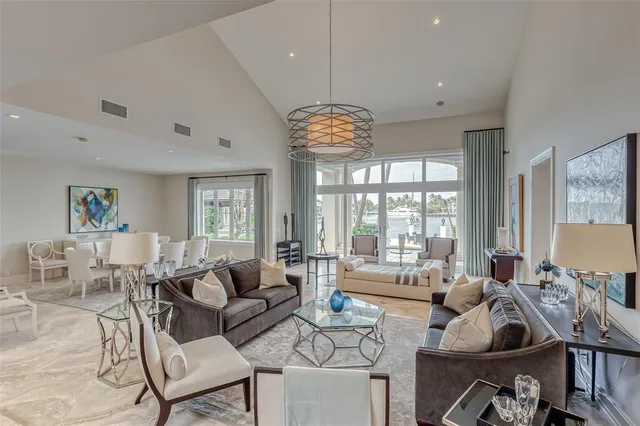 a view of an entryway with wooden floor and windows
