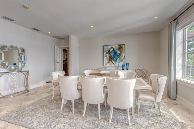 a kitchen with stainless steel appliances granite countertop a stove and cabinets