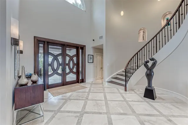 a bathroom with a glass shower door