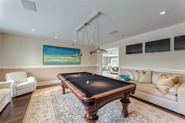 a view of living room with furniture and a large window