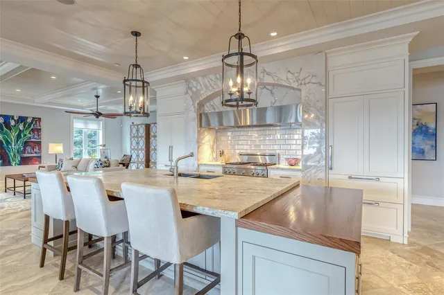 a bedroom with two beds and a large window