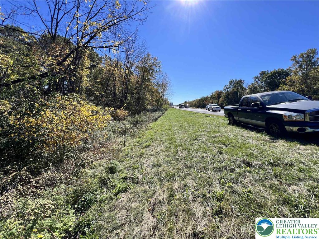 a view of a yard with an outdoor space