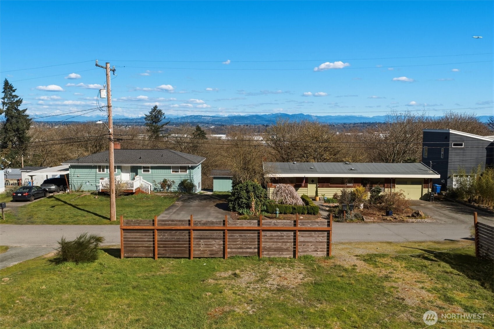 9017 3rd Avenue Southwest Seattle, WA 98106 - Photo 9 of 12 a view of a house with a yard and sitting area