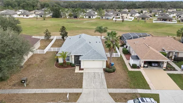 aerial view of a house with outdoor space