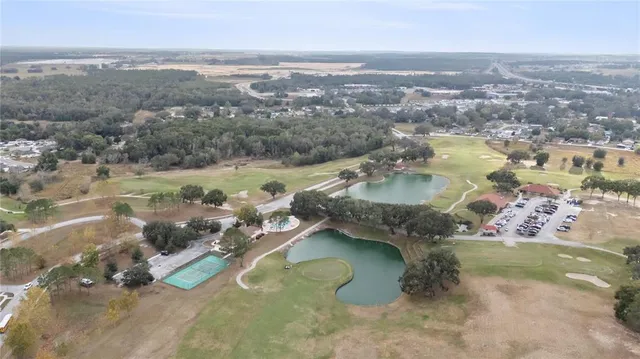an aerial view of residential house with outdoor space