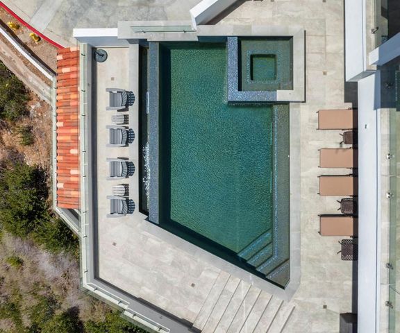 a view of a door and a window