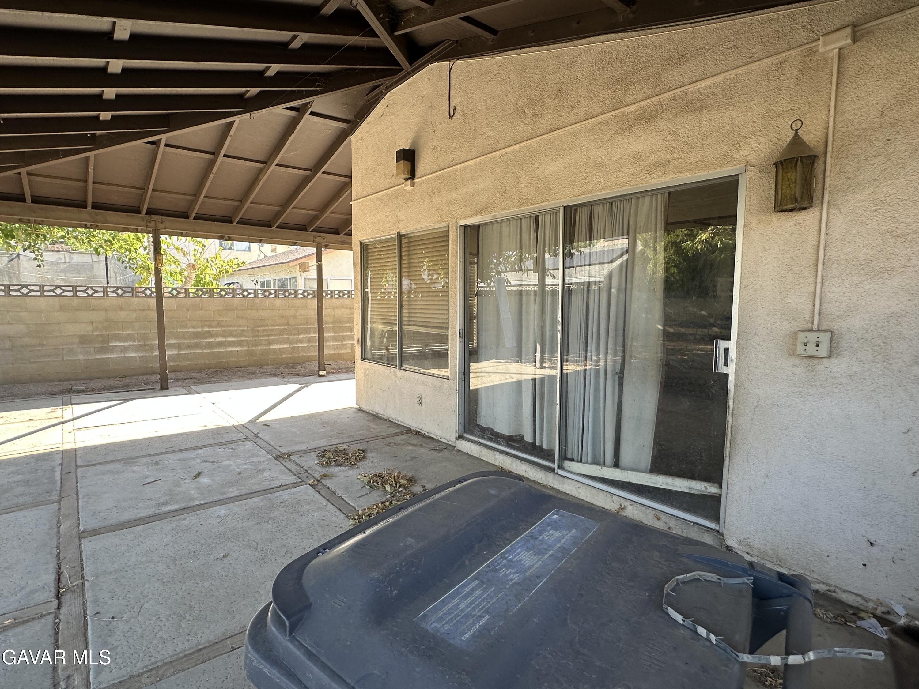 1111 Caperton Street Lancaster, CA 93535 - Photo 13 of 49 a room with a bed and a chair