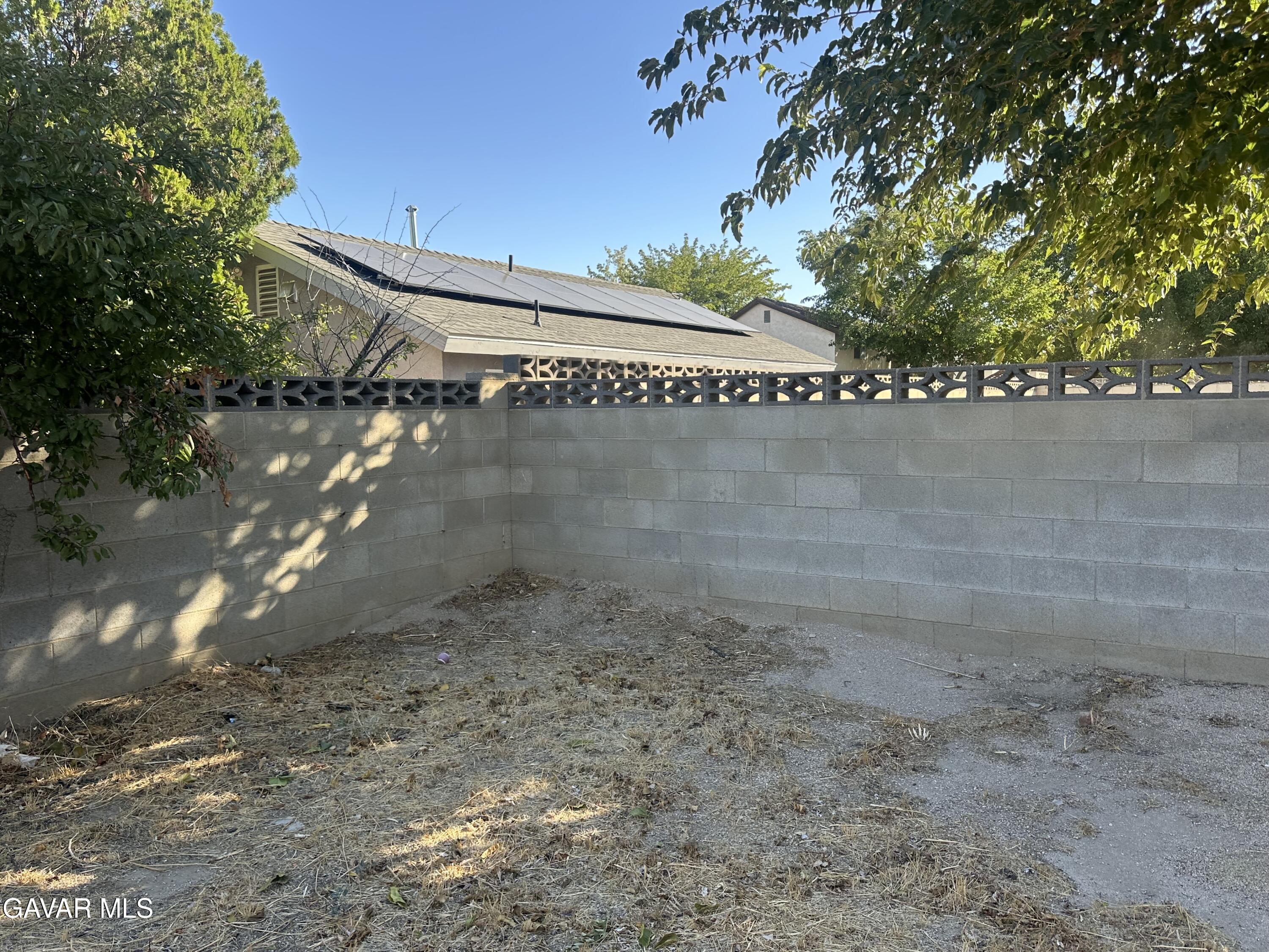 1111 Caperton Street Lancaster, CA 93535 - Photo 30 of 49 a view of a pathway of a yard