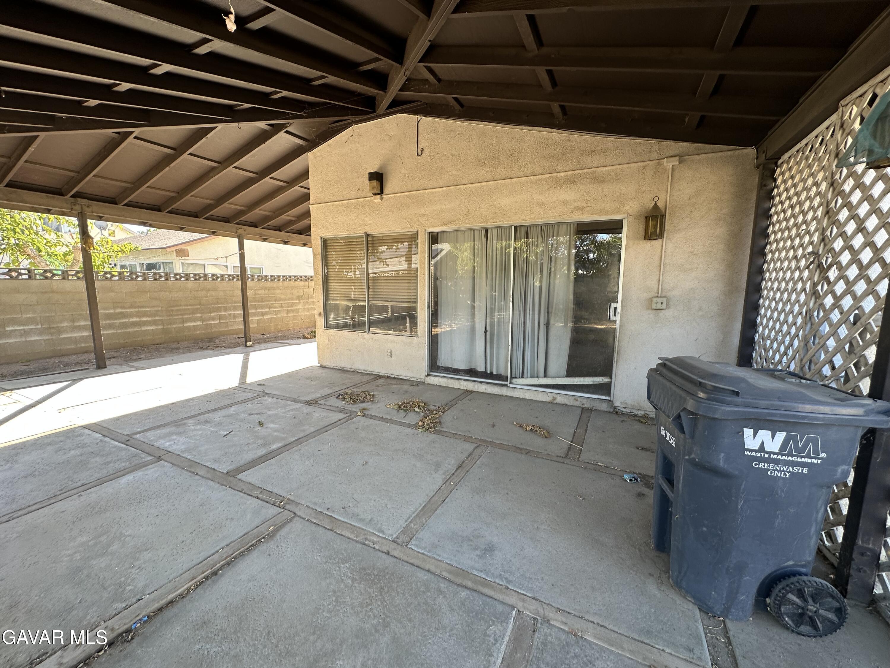 1111 Caperton Street Lancaster, CA 93535 - Photo 10 of 49 a view of an empty room with wooden floor