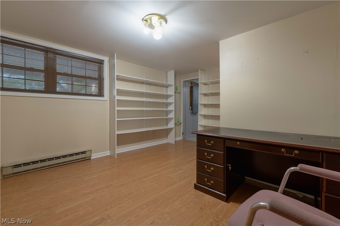 3963 Mark Road Cambridge, OH 43725 - Photo 38 of 50 Office space with a baseboard radiator and light hardwood / wood-style flooring