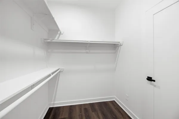 a view of an empty walk in closet