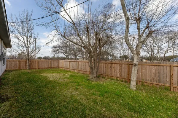 a view of a backyard with a garden