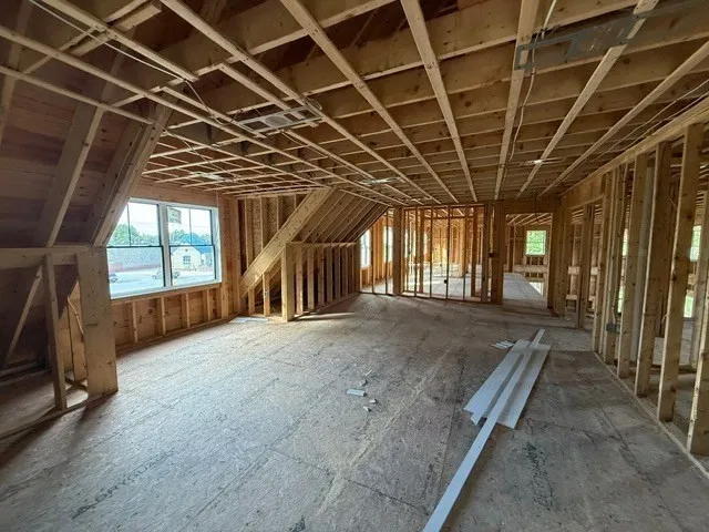 a view of porch with wooden floor