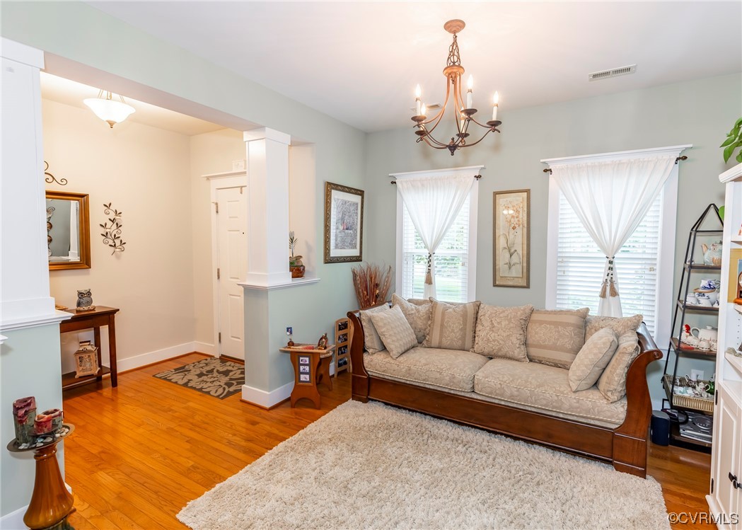 337 Shelton Place Aylett, VA 23009 - Photo 11 of 34 a living room with furniture and a chandelier
