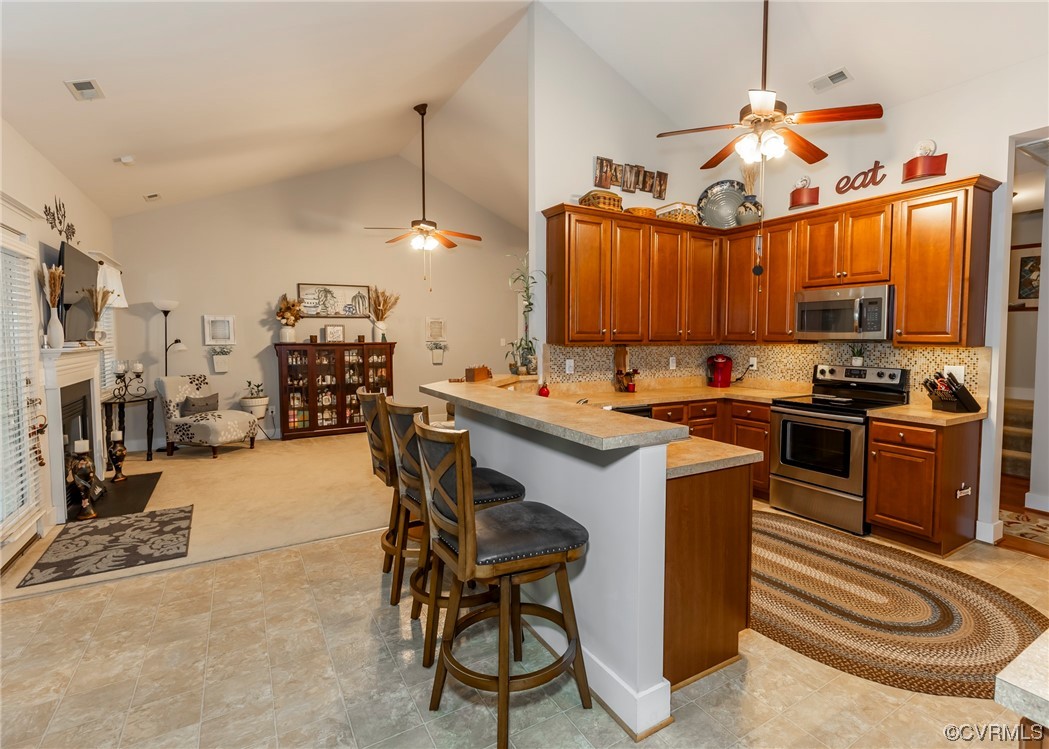 337 Shelton Place Aylett, VA 23009 - Photo 17 of 34 a kitchen that has a lot of cabinets appliances and a chair