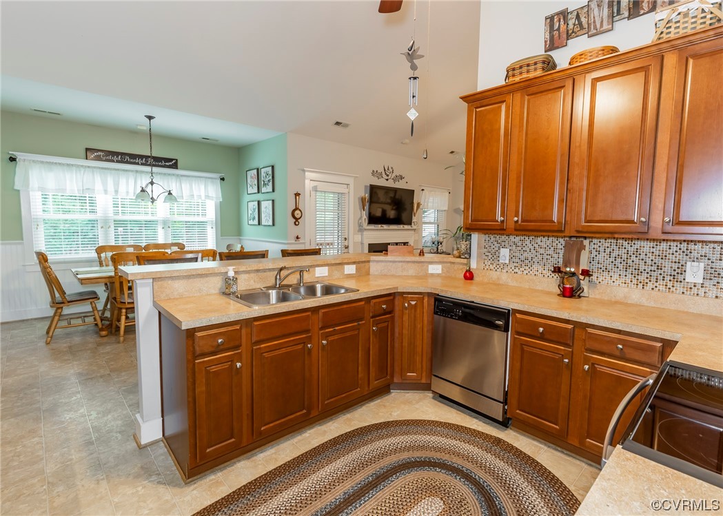 337 Shelton Place Aylett, VA 23009 - Photo 18 of 34 a kitchen with stainless steel appliances granite countertop a sink stove and cabinets